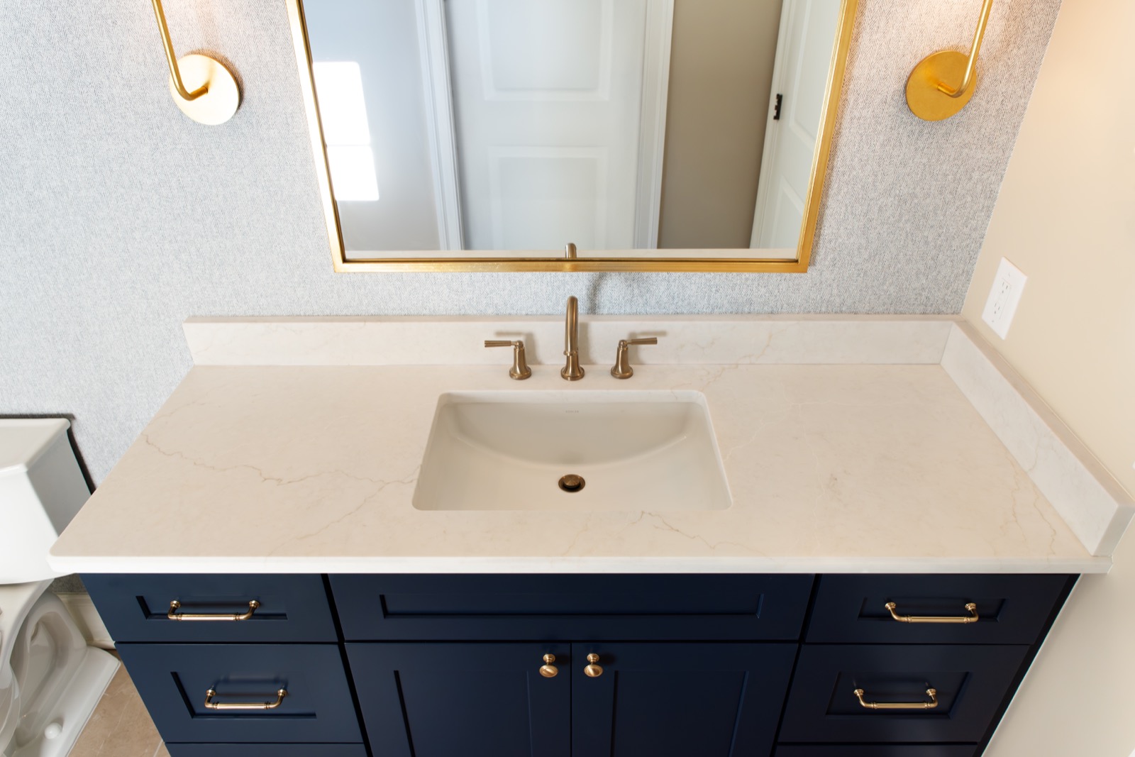 Bathroom vanity in Calacatta Miraggio Cove quartz with rectangle sink
