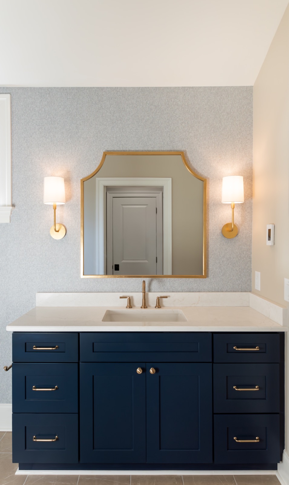 Bathroom vanity in Calacatta Miraggio Cove quartz with rectangle sink