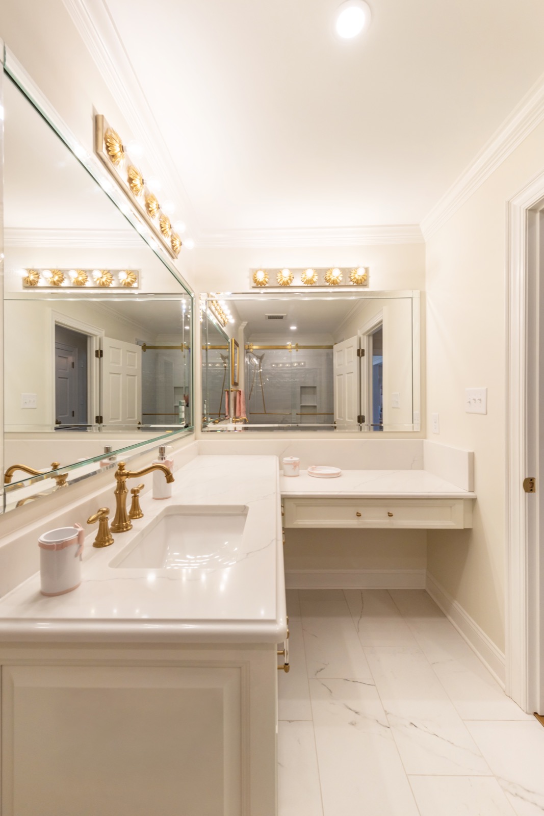 Double bathroom vanity in Calacatta Gold finish with ogee edge