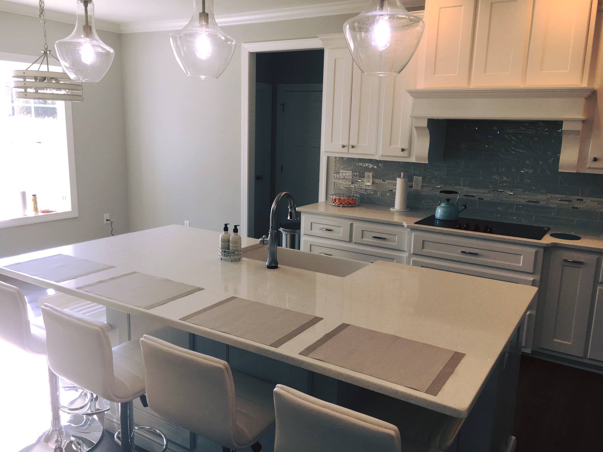 White quartz kitchen island